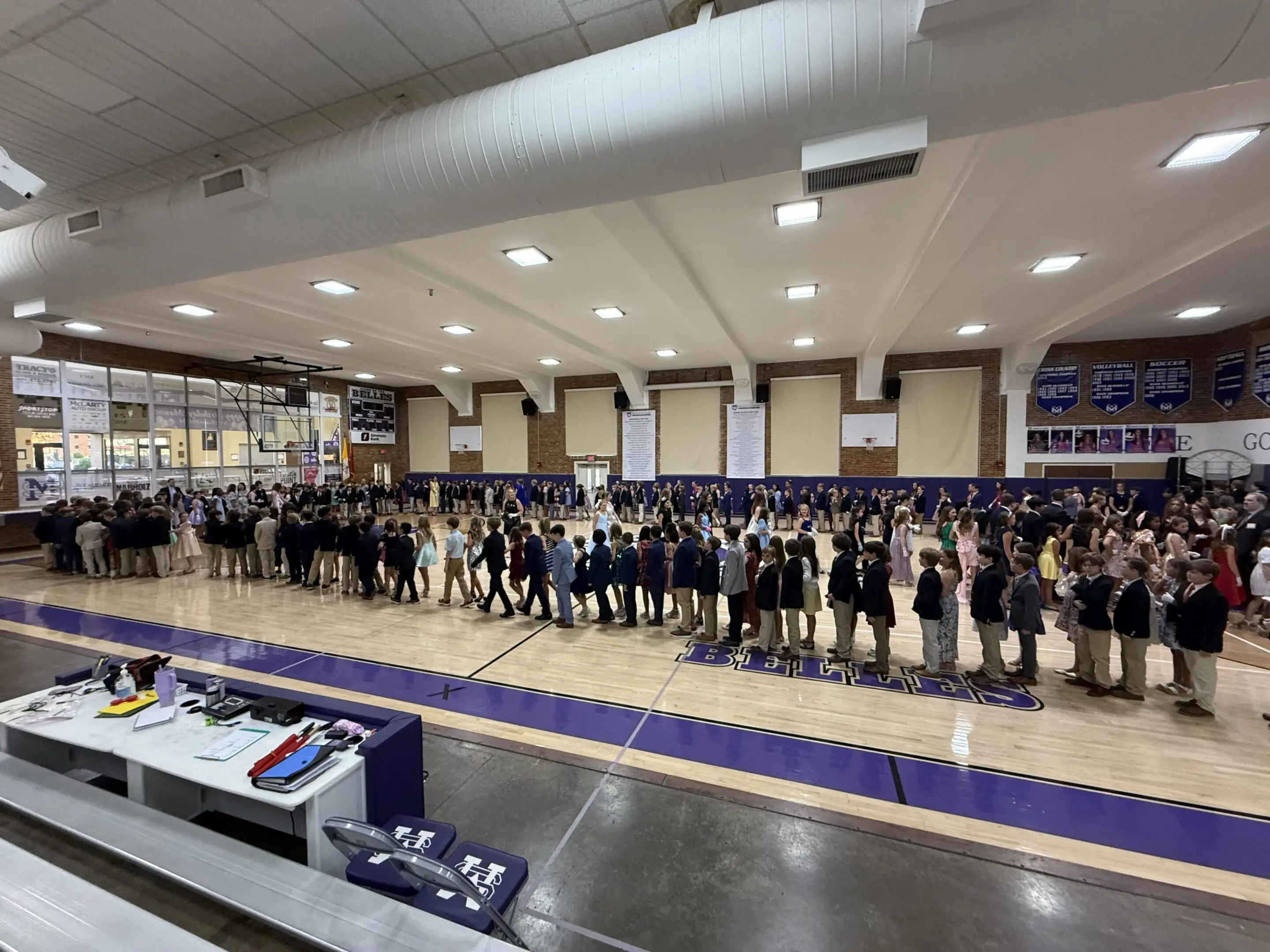 Little Rock Junior Cotillion students in formal attire practicing ballroom dance